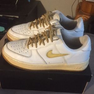 Gold and white Air Force 1’s